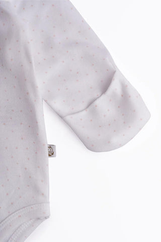 Full sleeve soft pink dot pattern in white bodysuit for baby