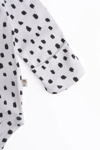 Full sleeve white & black dot pattern bodysuit for baby